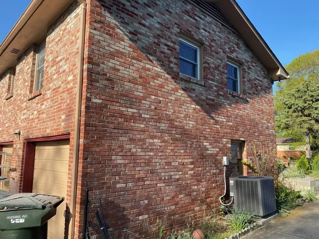 a kitchen with granite countertop stainless steel appliances white cabinets granite counter tops and a sink