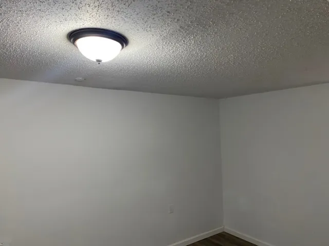 an empty room with a workbench