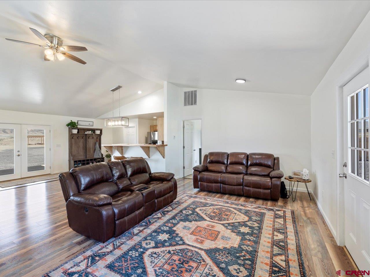 3580 Ruth Lane Delta, CO 81416 - Photo 12 of 35 a living room with furniture and a rug