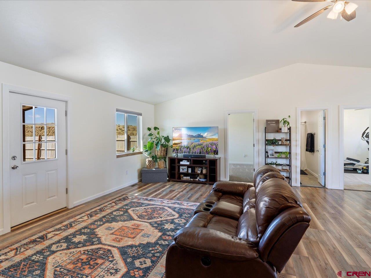 3580 Ruth Lane Delta, CO 81416 - Photo 16 of 35 a living room with furniture and a fireplace