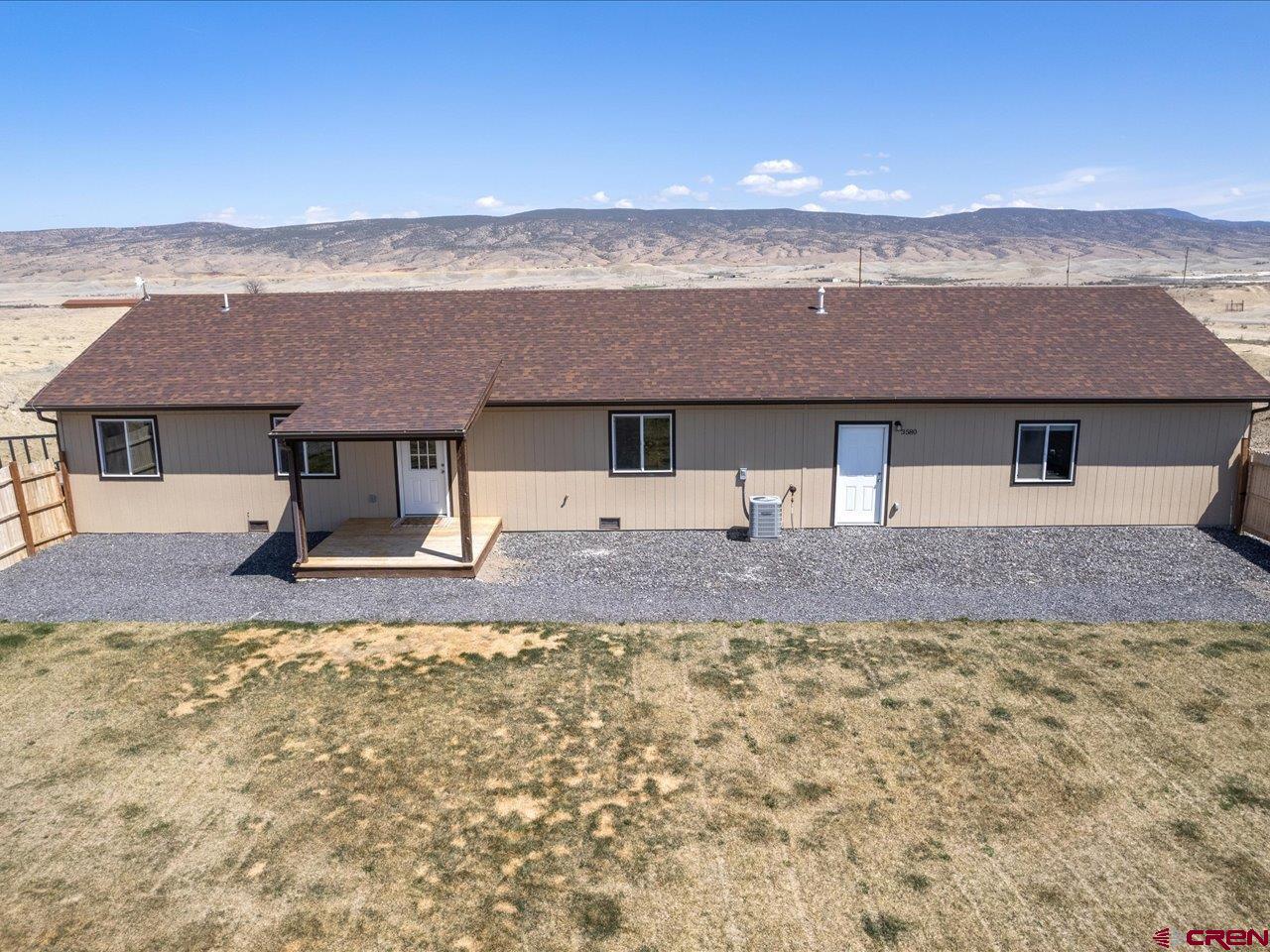 3580 Ruth Lane Delta, CO 81416 - Photo 4 of 35 a front view of a house with a yard