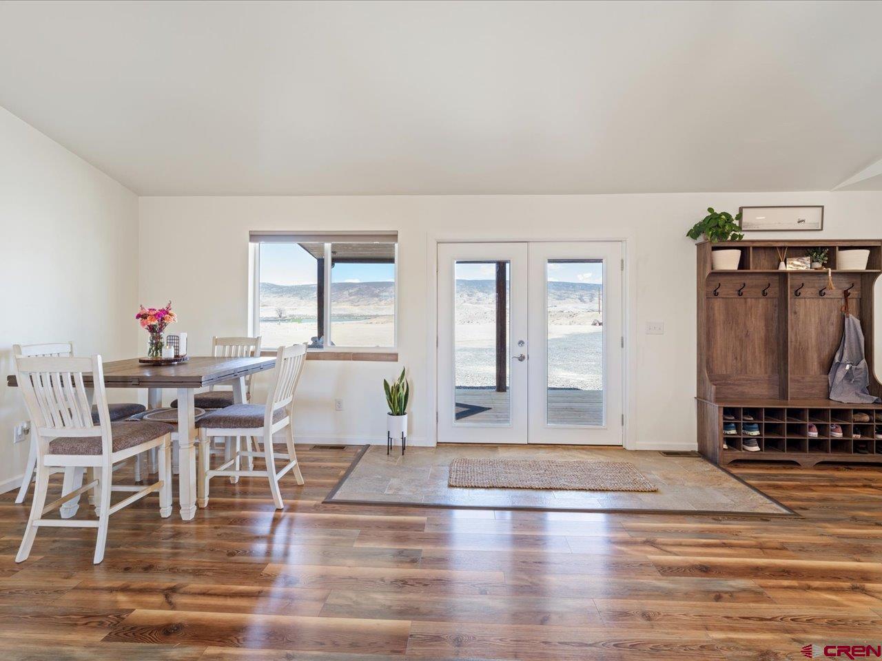 3580 Ruth Lane Delta, CO 81416 - Photo 5 of 35 a view of a livingroom with furniture wooden floor and windows