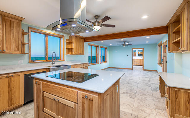 6233 West Airport Road Willcox, AZ 85643 - Photo 21 of 54 a kitchen with a sink a counter top space and stainless steel appliances