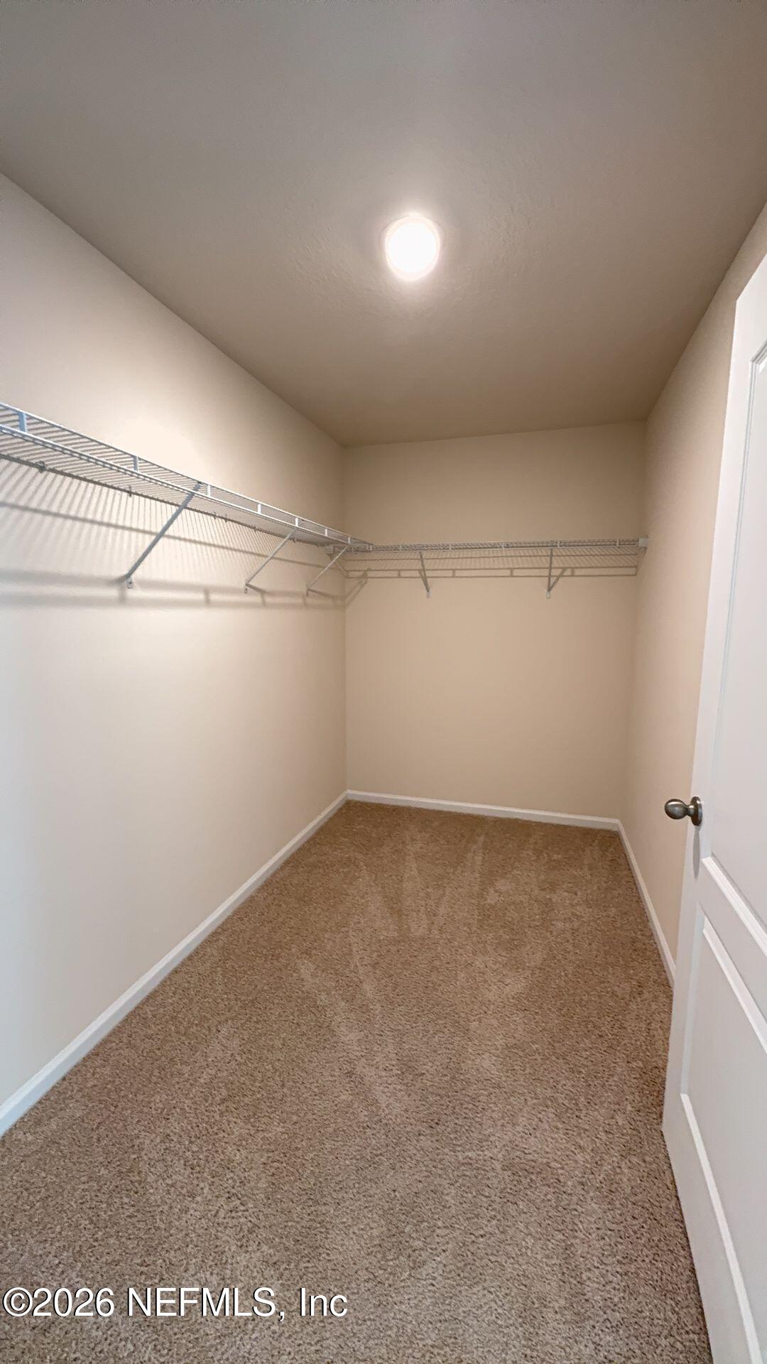 144 Redbud Road Palm Coast, FL 32137 - Photo 16 of 29 a view of an empty room