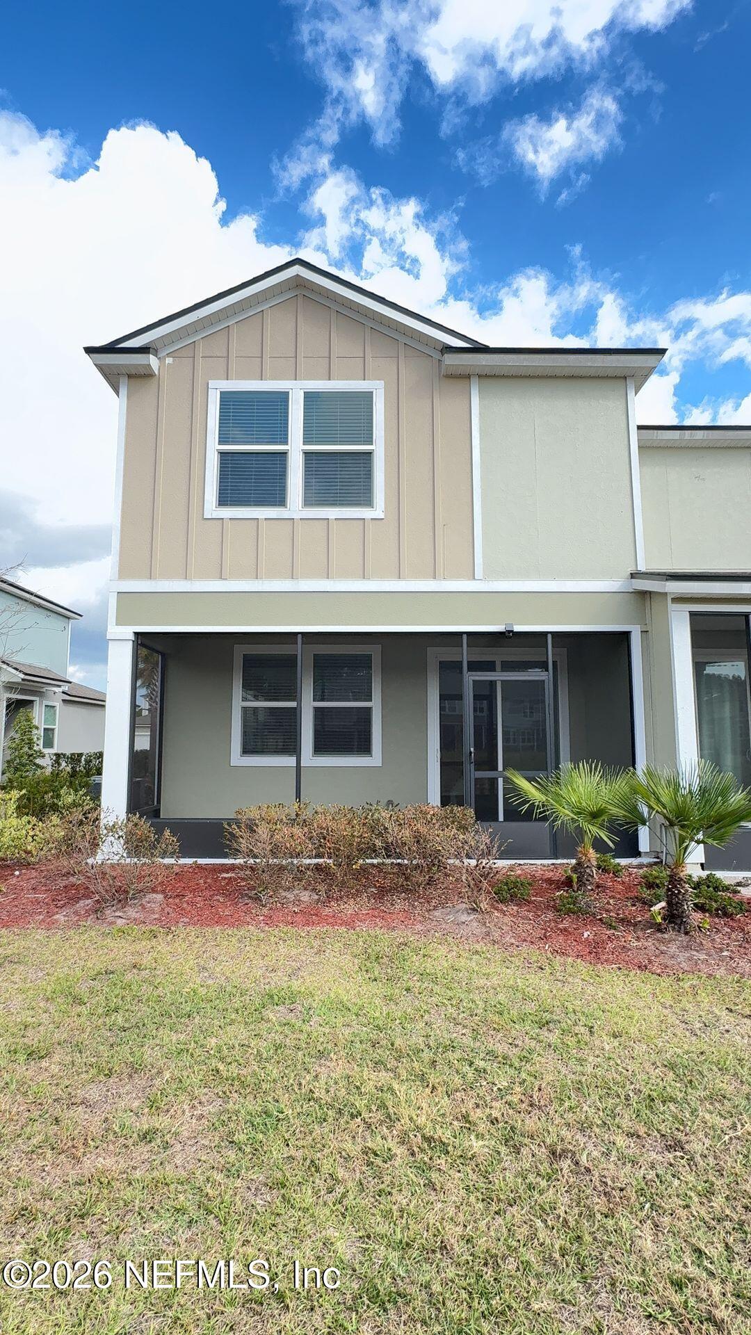144 Redbud Road Palm Coast, FL 32137 - Photo 28 of 29 a front view of a house with parking space