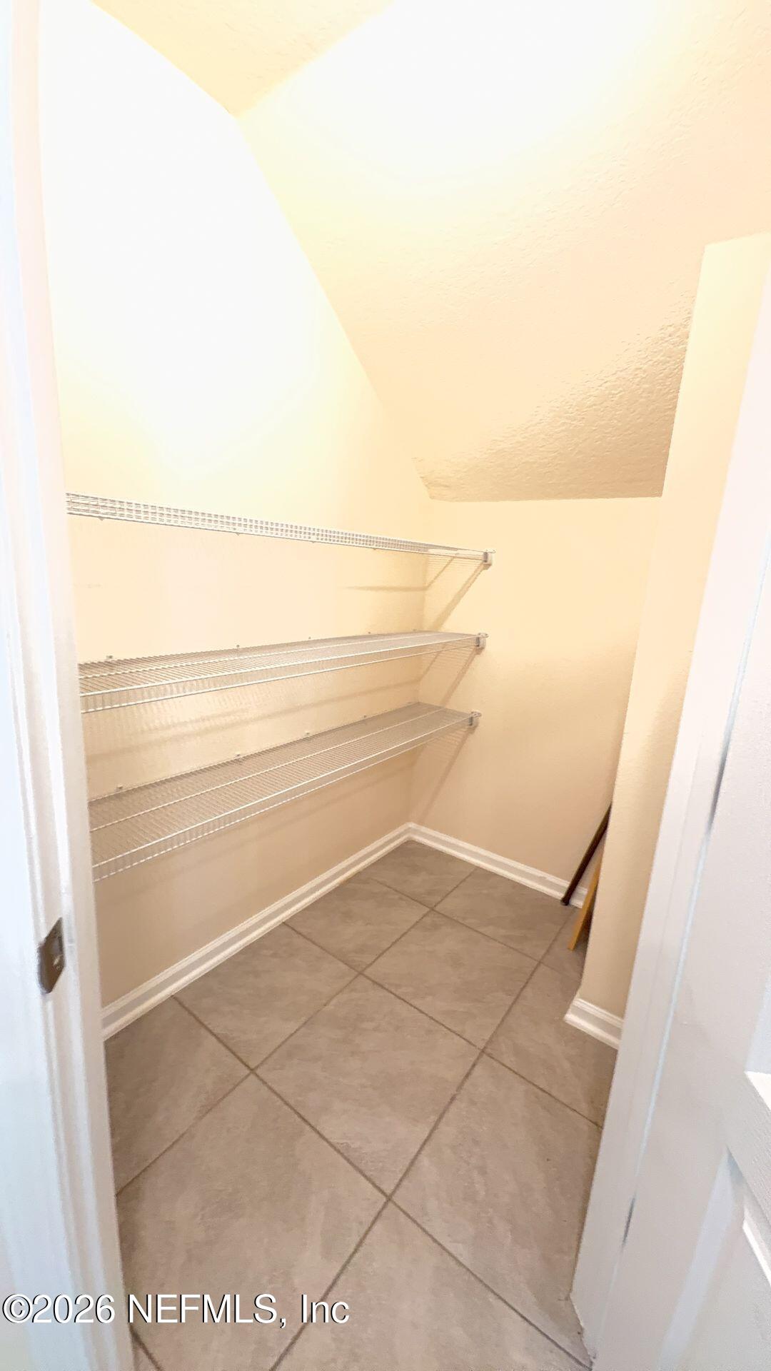 144 Redbud Road Palm Coast, FL 32137 - Photo 10 of 29 a view of a closet