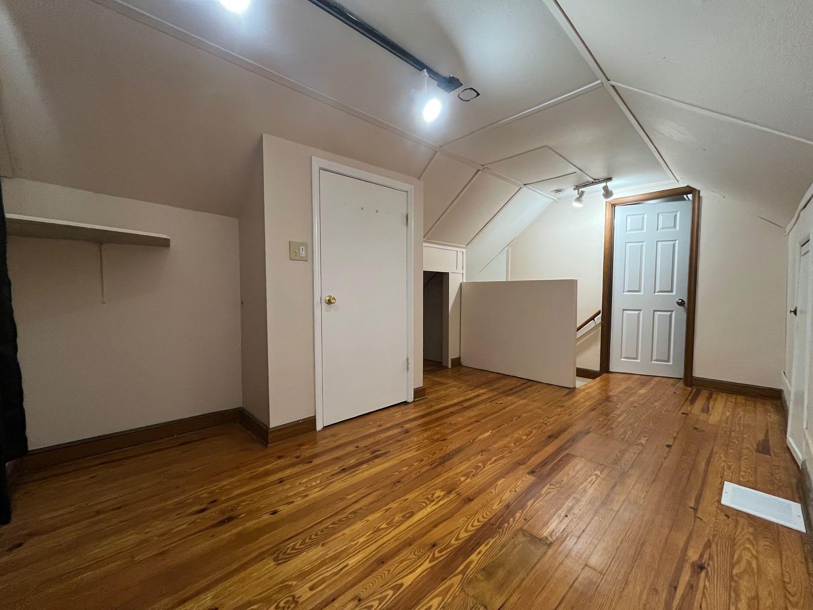2610 Colonial Avenue Southwest Roanoke, VA 24015 - Photo 4 of 15 a view of empty room with wooden floor