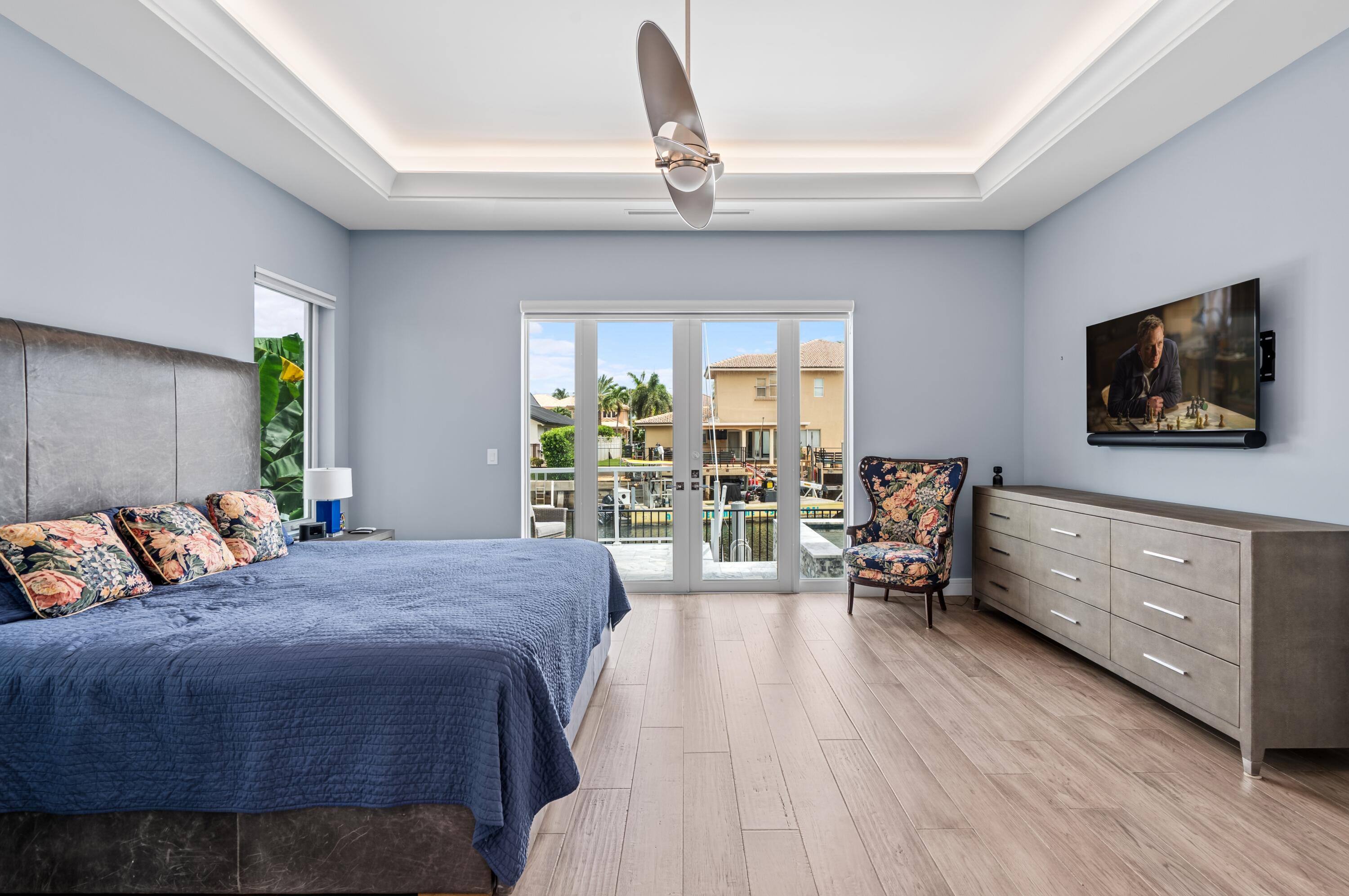 807 Dover Street Boca Raton, FL 33487 - Photo 12 of 43 a bed room with a bed and a chair