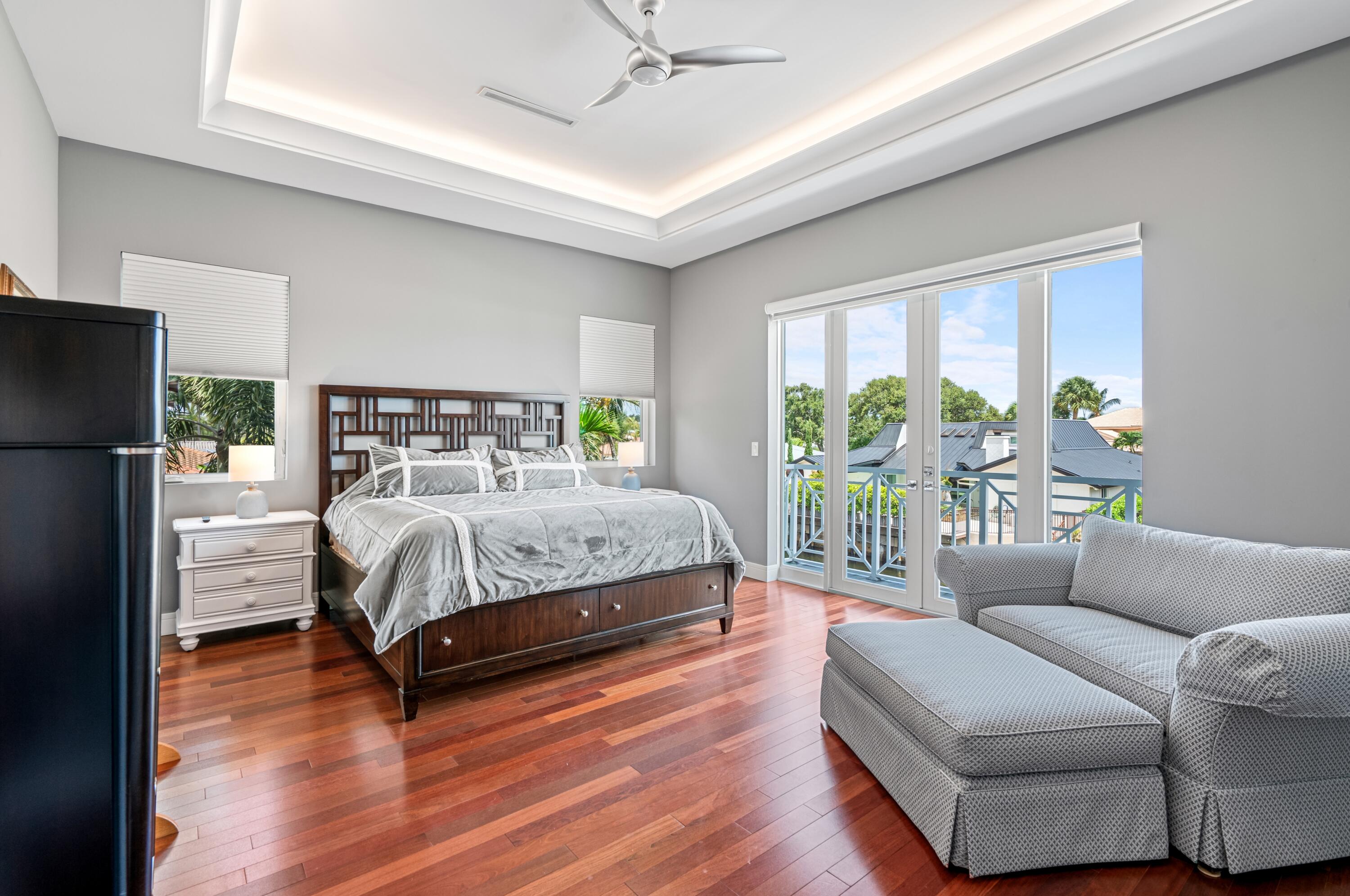 807 Dover Street Boca Raton, FL 33487 - Photo 16 of 43 a bedroom with a bed couch and a window