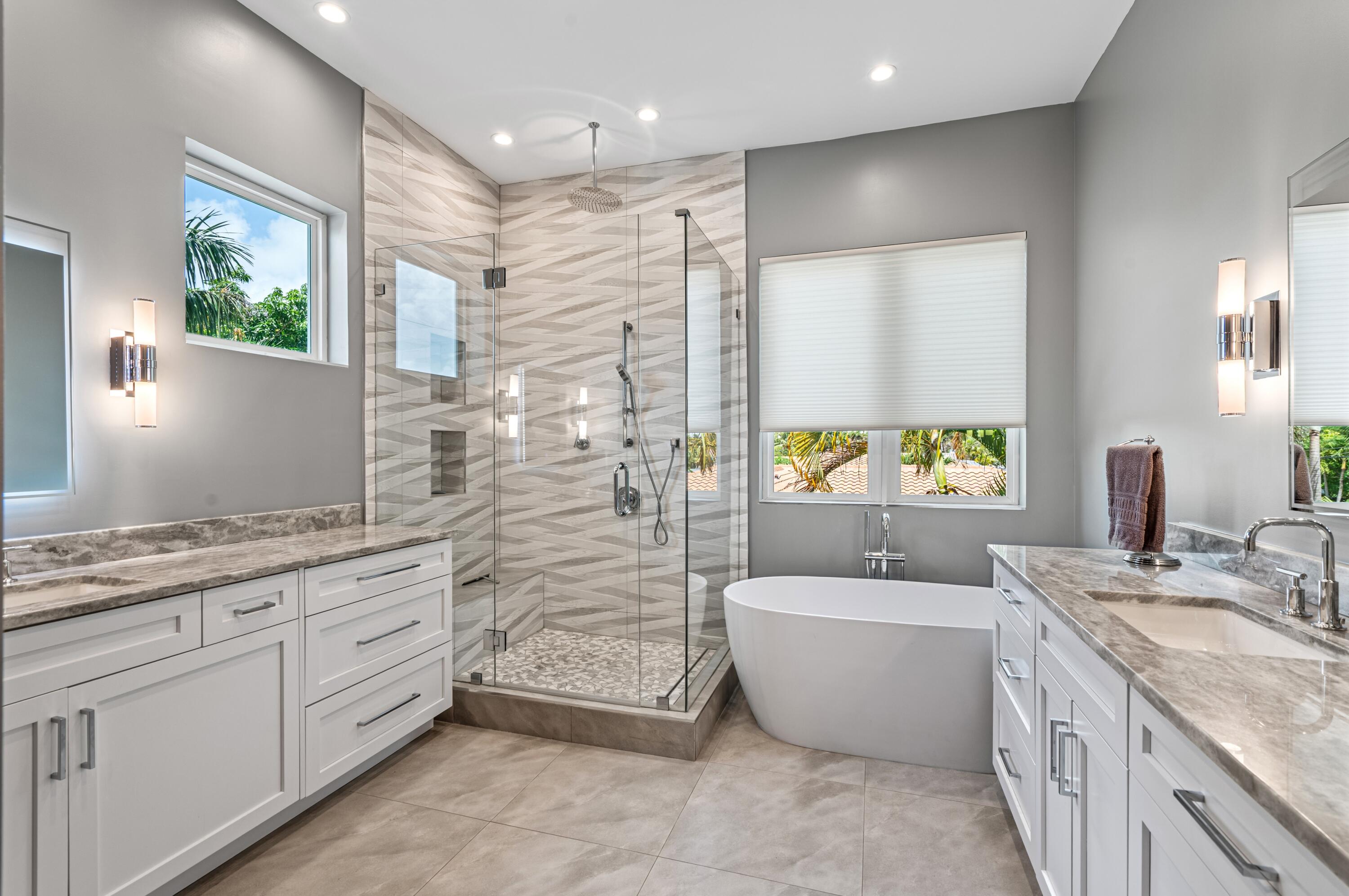 807 Dover Street Boca Raton, FL 33487 - Photo 17 of 43 a bathroom with a granite countertop sink mirror and bathtub