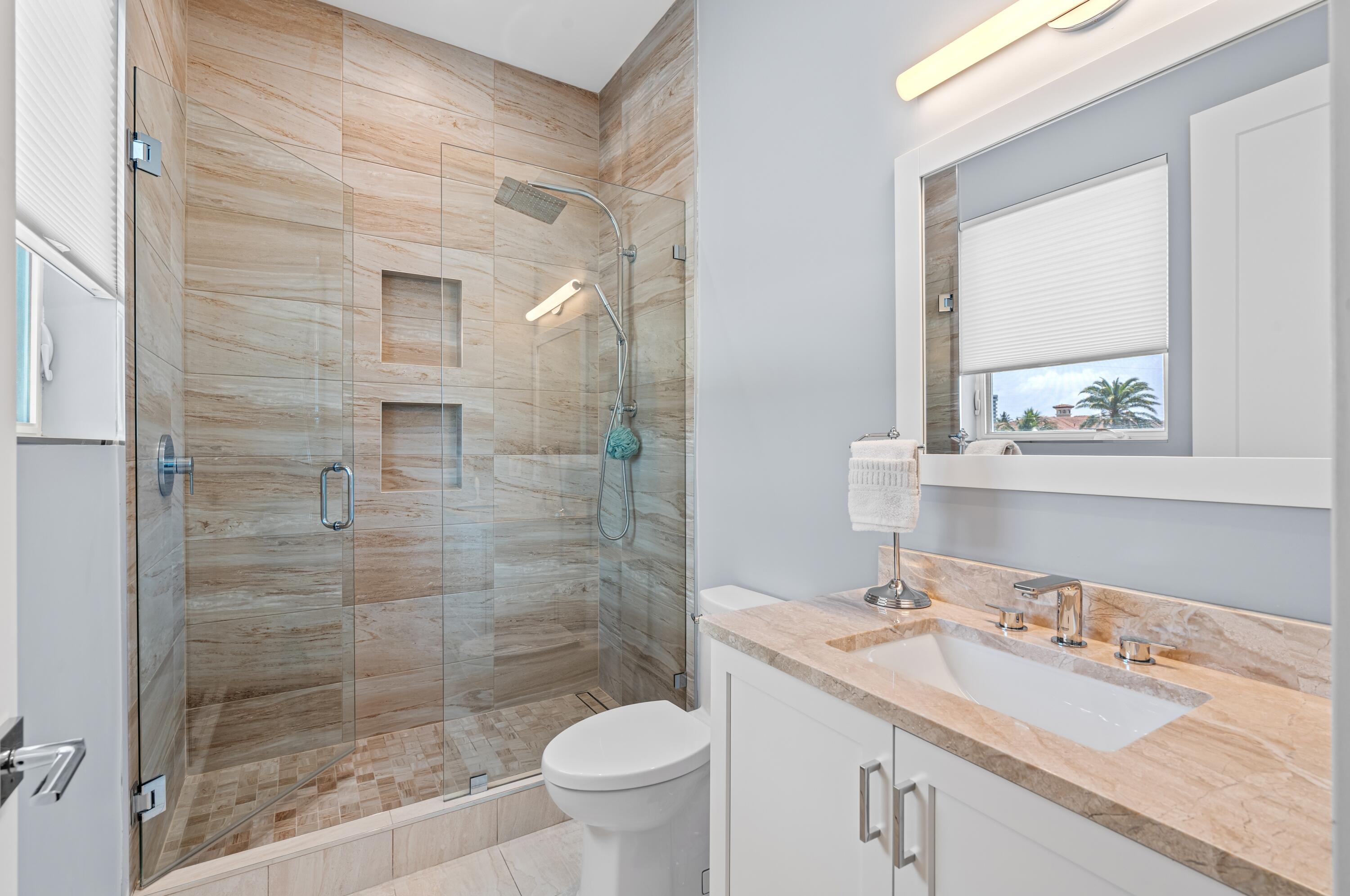 807 Dover Street Boca Raton, FL 33487 - Photo 23 of 43 a bathroom with a sink a toilet and shower