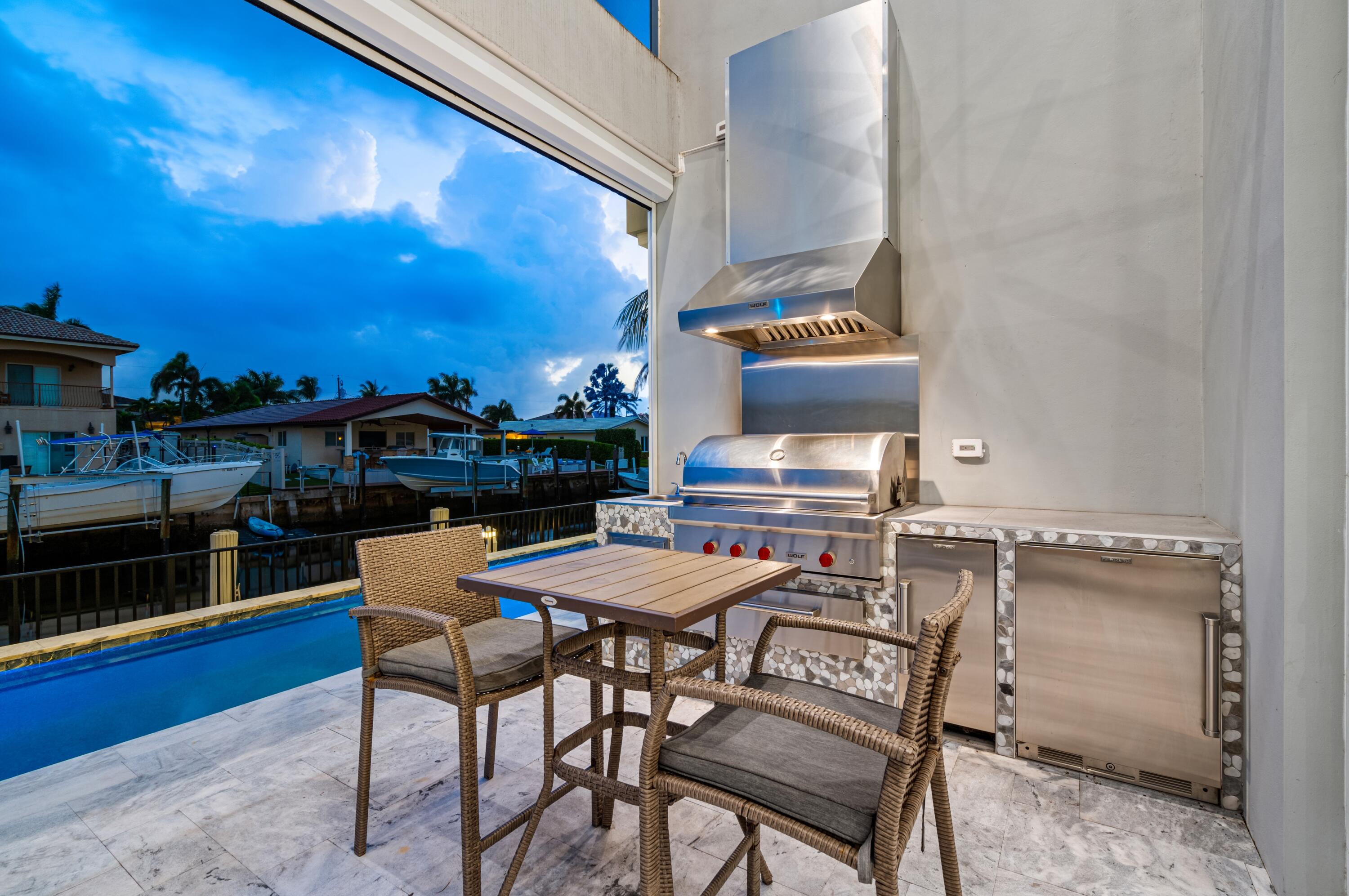 807 Dover Street Boca Raton, FL 33487 - Photo 28 of 43 a view of a chairs and table in the terrace