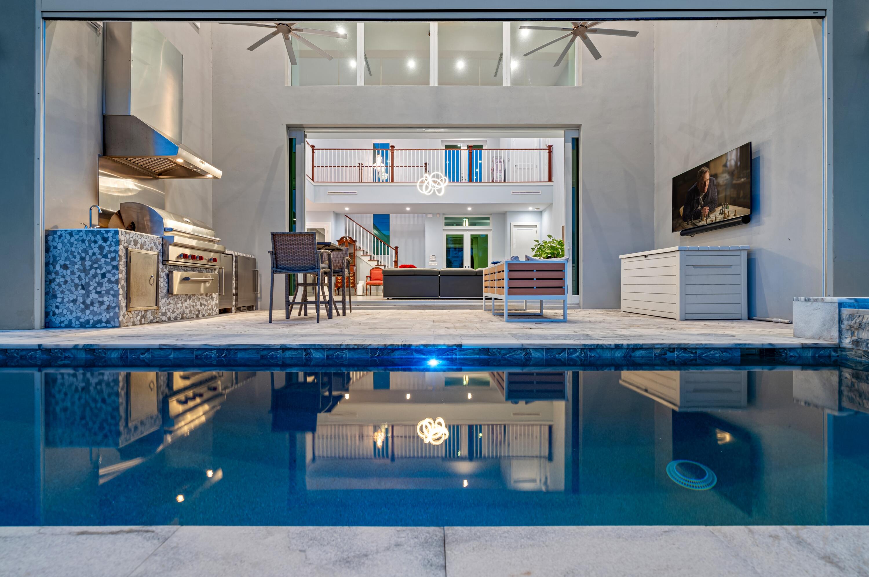 807 Dover Street Boca Raton, FL 33487 - Photo 30 of 43 a living room with furniture and a flat screen tv