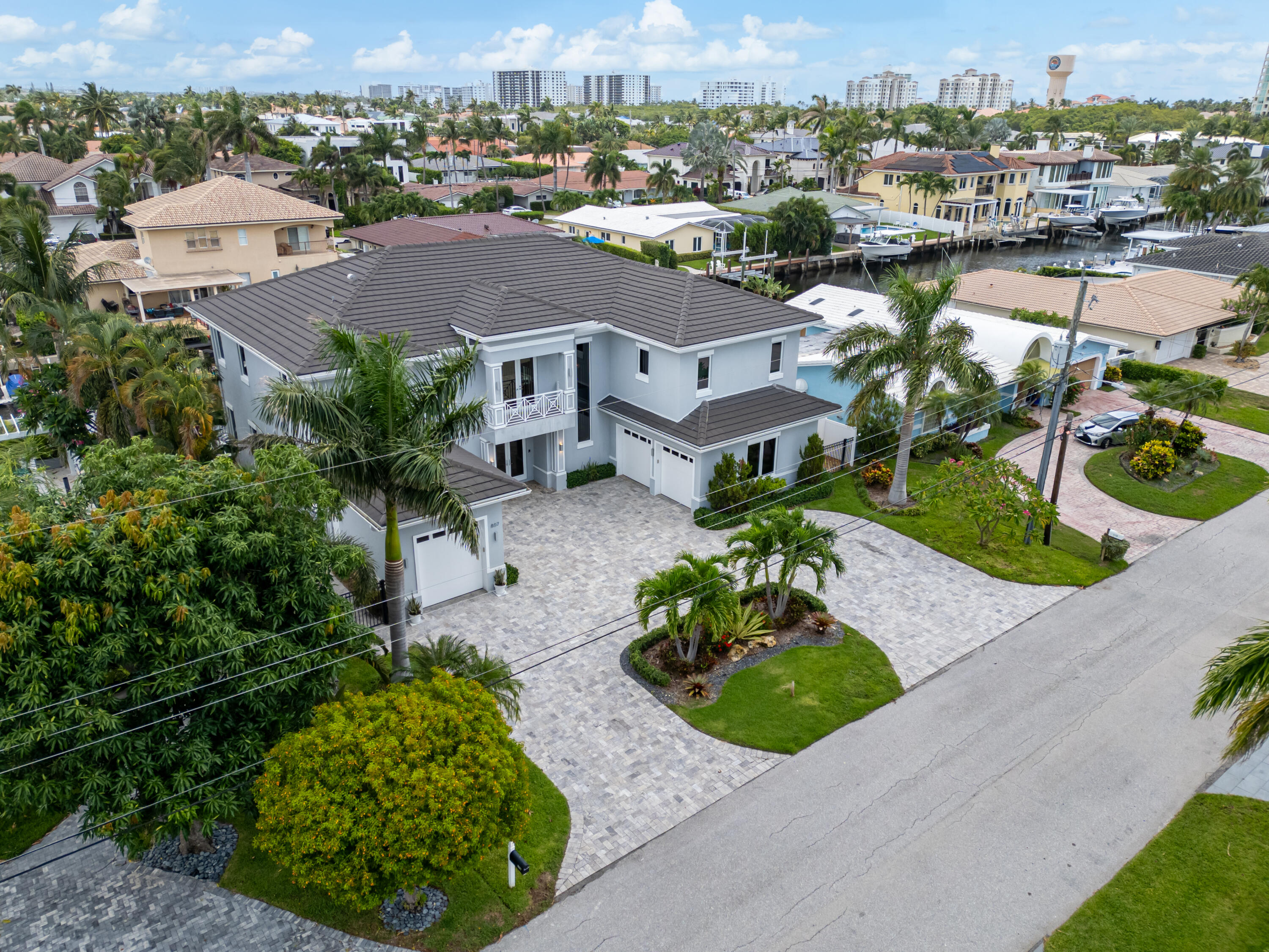 807 Dover Street Boca Raton, FL 33487 - Photo 43 of 43 an aerial view of a house with a yard and lake view