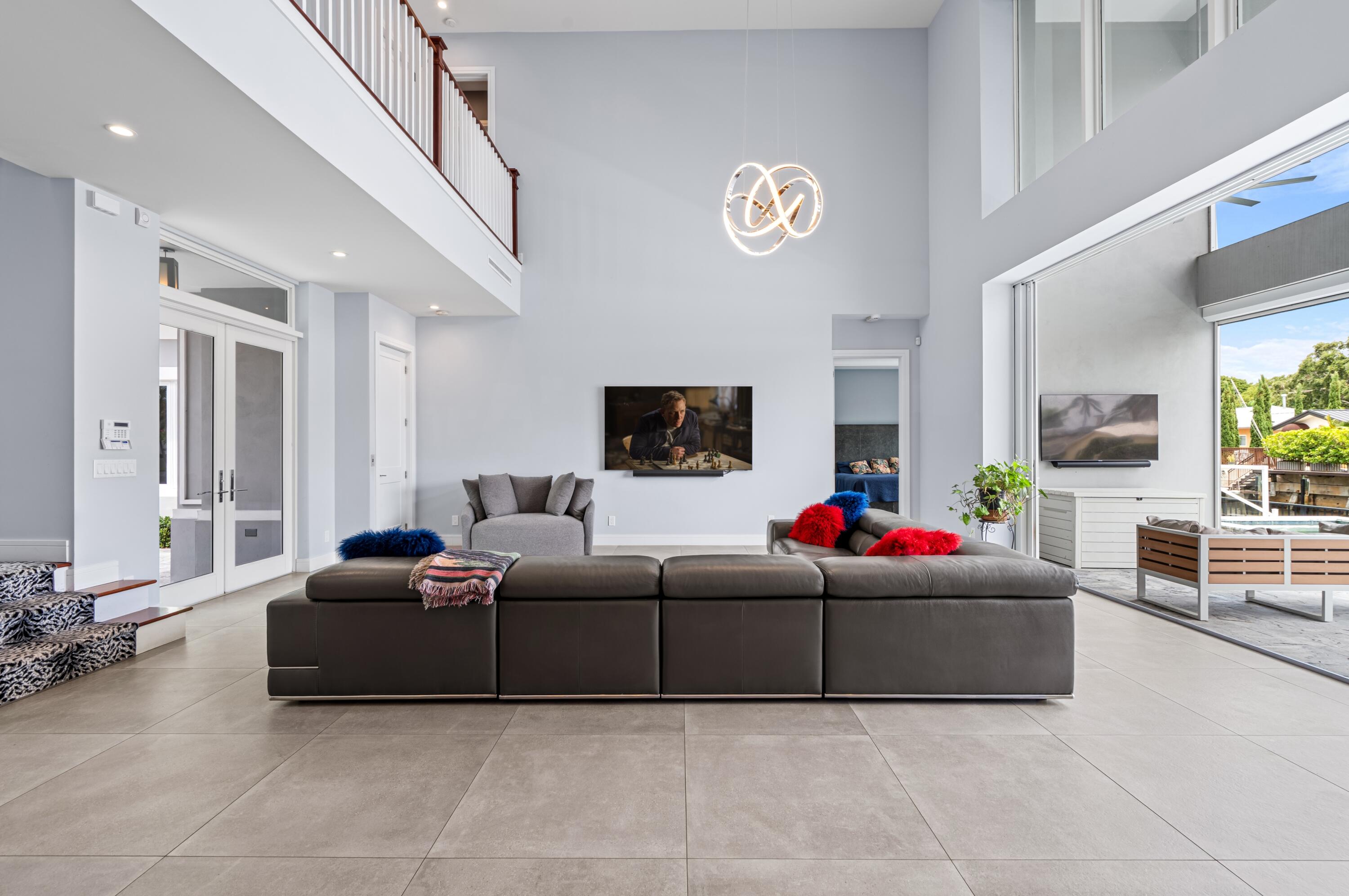 807 Dover Street Boca Raton, FL 33487 - Photo 5 of 43 a living room with furniture and a flat screen tv