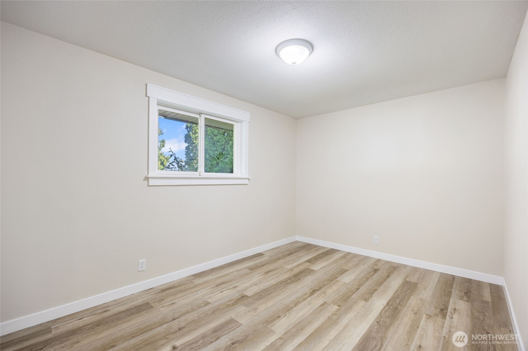 247 Northeast Ivy Ephrata, WA 98823 - Photo 13 of 40 an empty room with a window