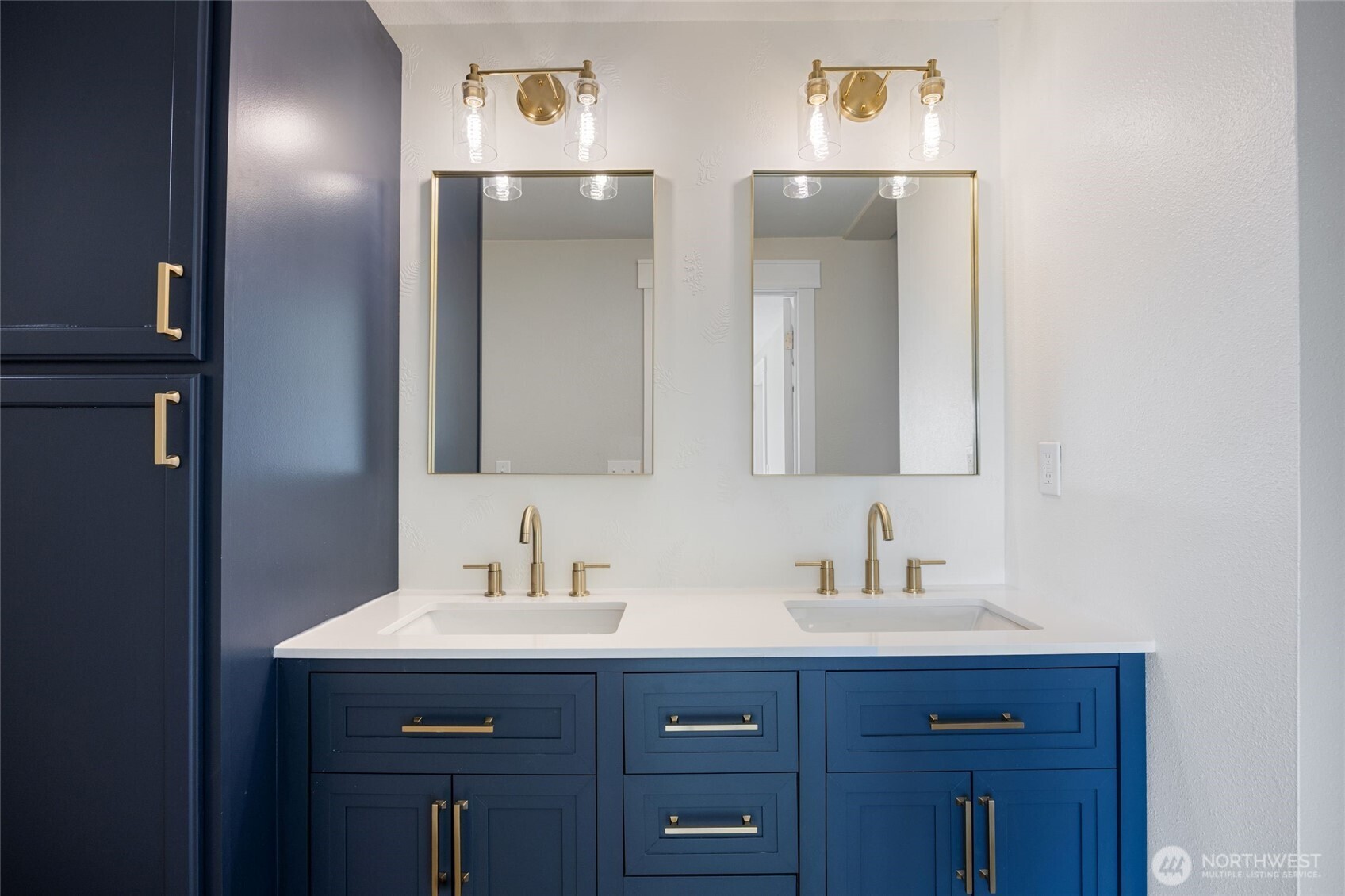 247 Northeast Ivy Ephrata, WA 98823 - Photo 21 of 40 a bathroom with a sink and two mirror
