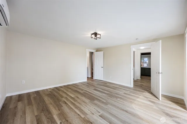a view of an empty room and window