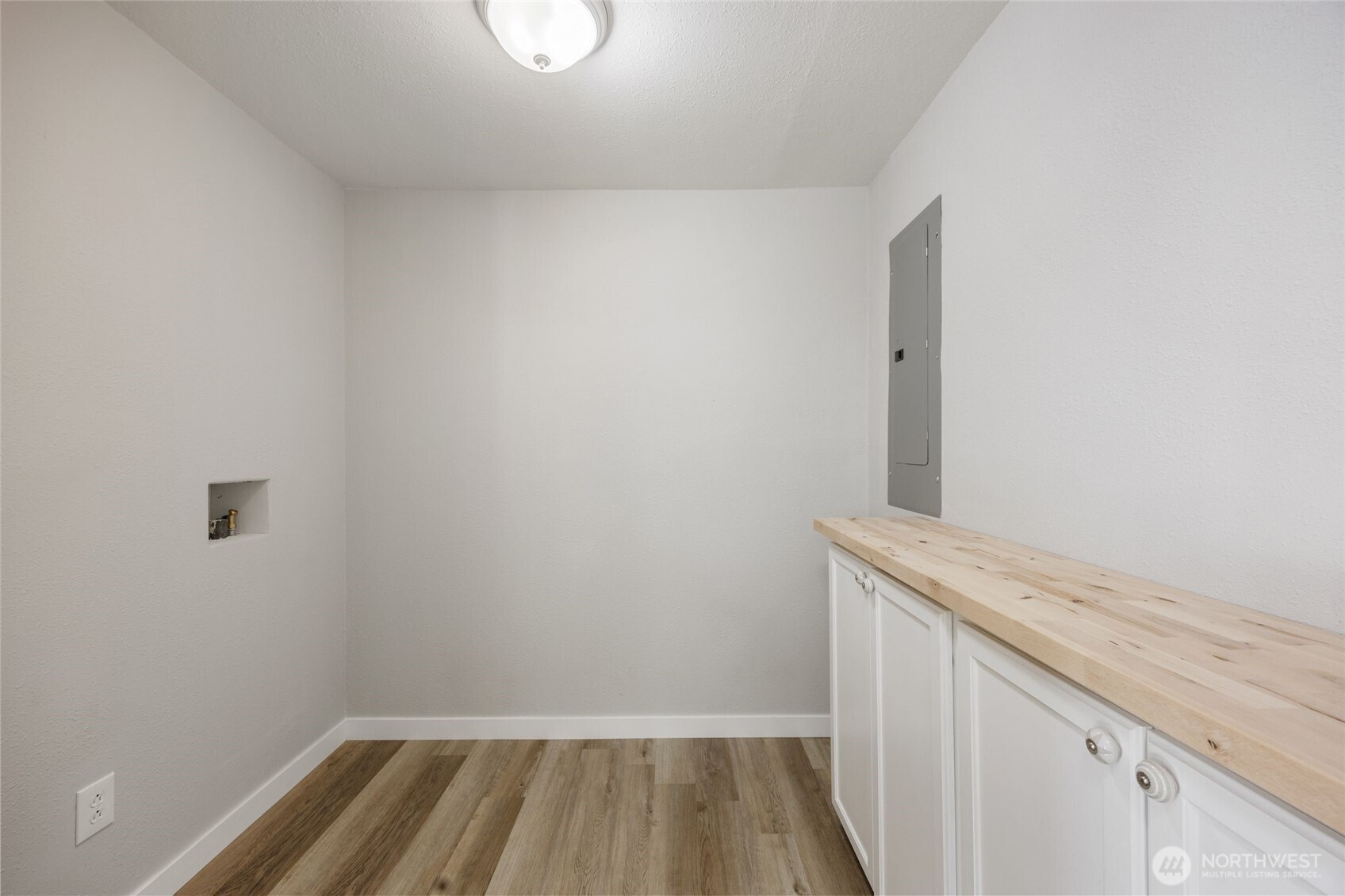 247 Northeast Ivy Ephrata, WA 98823 - Photo 26 of 40 a view of a room with wooden floor
