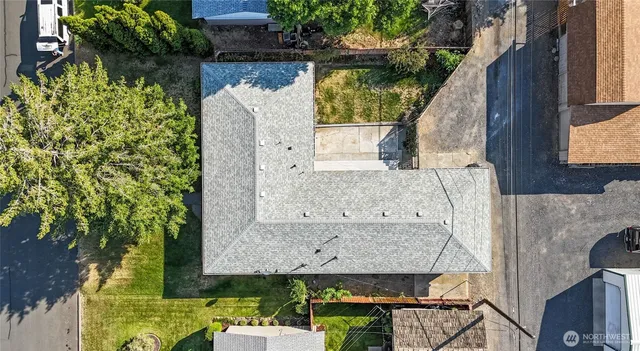 an aerial view of a house with a garden