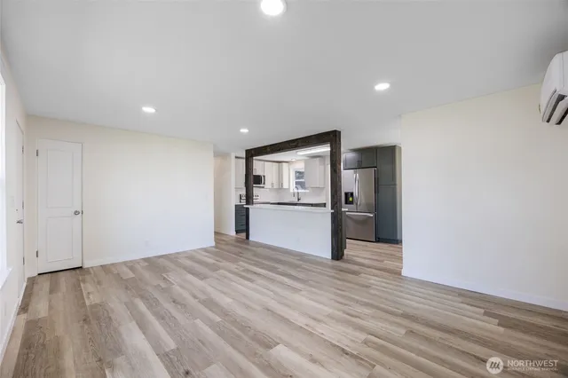 a view of kitchen with wooden floor