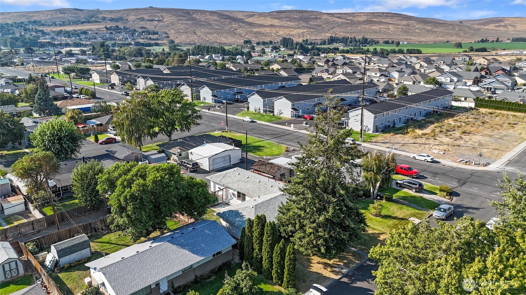 247 Northeast Ivy Ephrata, WA 98823 - Photo 39 of 40 an aerial view of a houses with a swimming pool