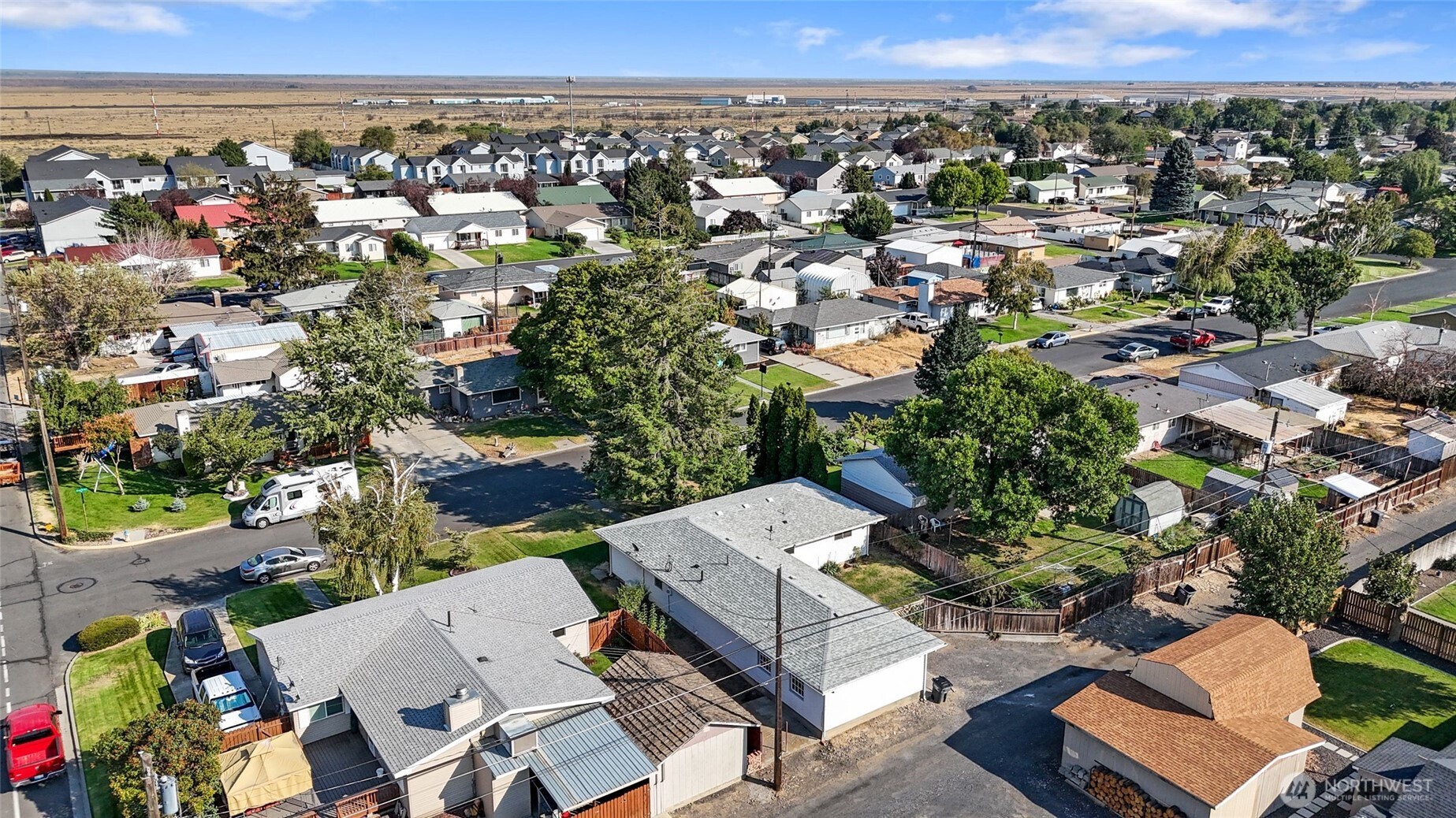 247 Northeast Ivy Ephrata, WA 98823 - Photo 4 of 40 an aerial view of a city with lots of residential buildings