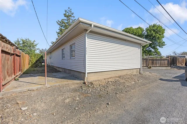 a house view with a backyard space