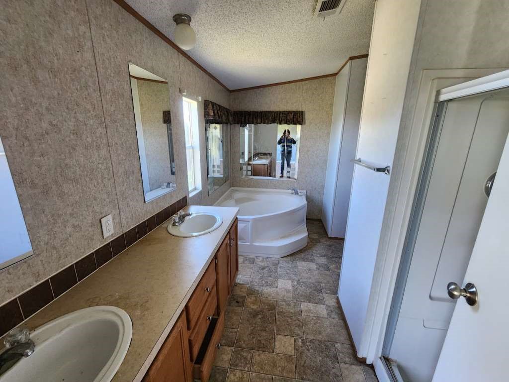 7640 Wd Court Lipan, TX 76462 - Photo 12 of 12 a bathroom with a sink a toilet and mirror