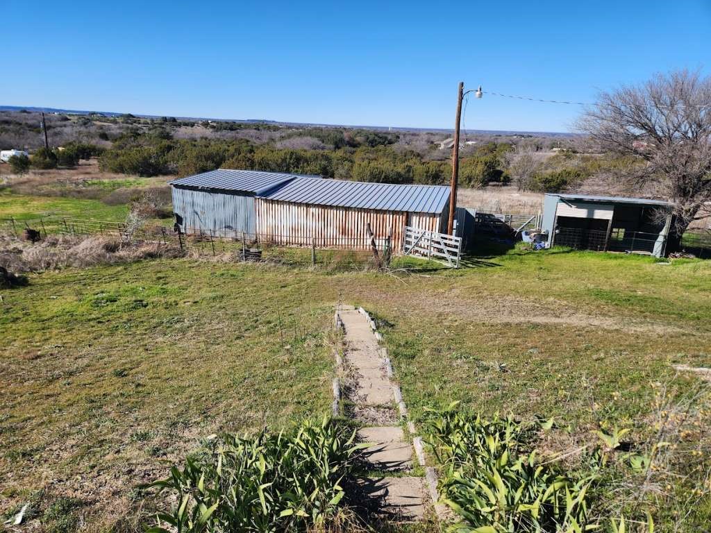 7640 Wd Court Lipan, TX 76462 - Photo 6 of 12 a view of a garden