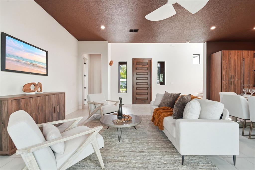 1615 Cole Road Orlando, FL 32803 - Photo 7 of 31 a living room with furniture and a large window