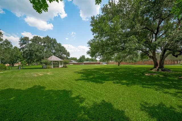 a view of a house with a big yard