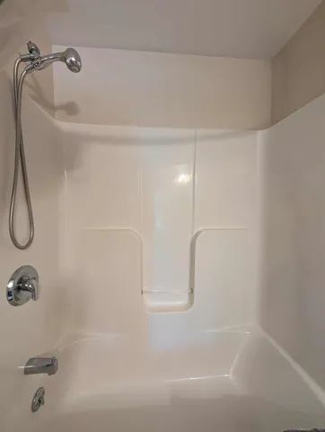 a close up of a bathtub