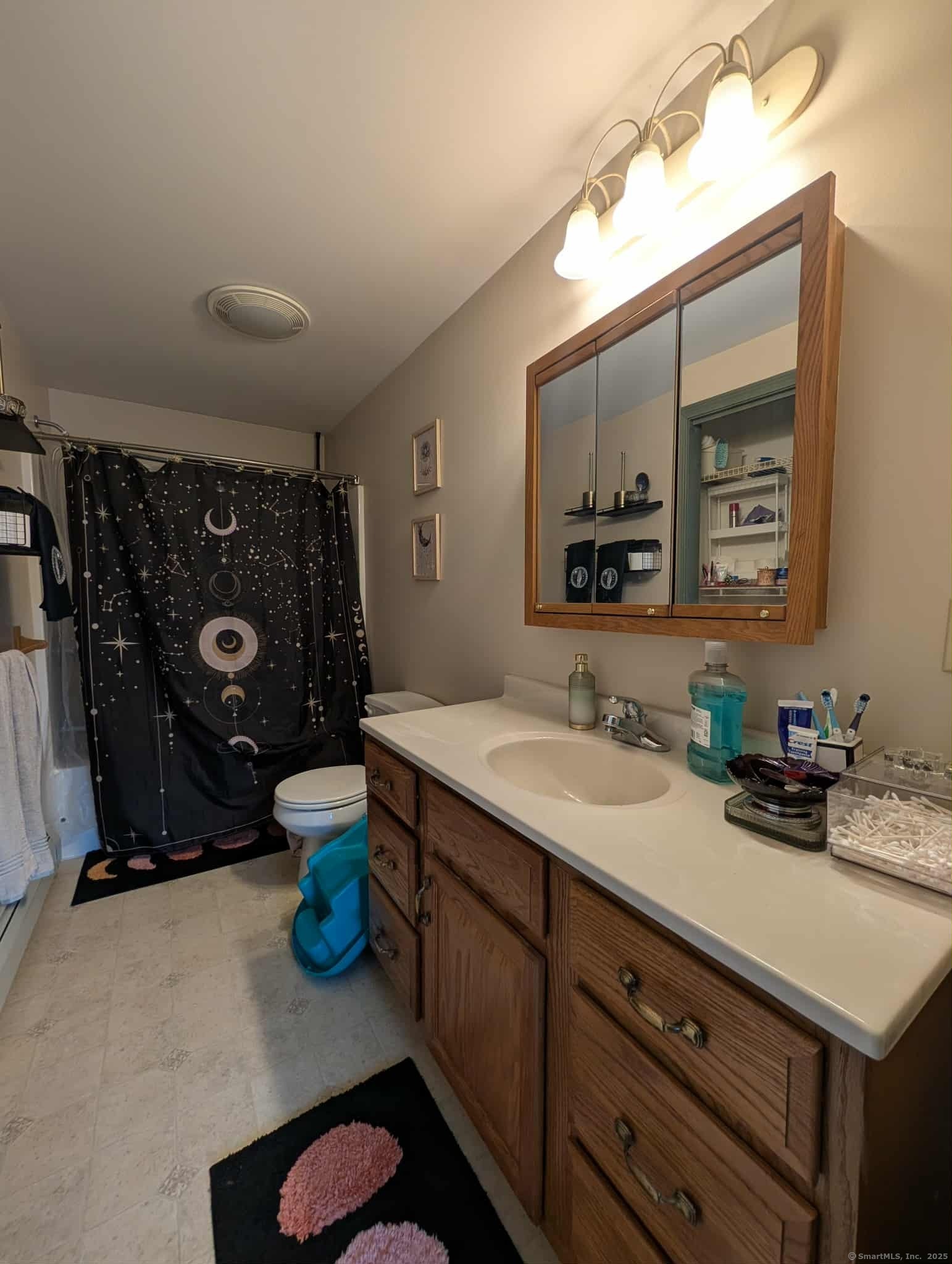 942 Riverside Drive Thompson, CT 06255 - Photo 19 of 21 a bathroom with a double vanity sink and a mirror