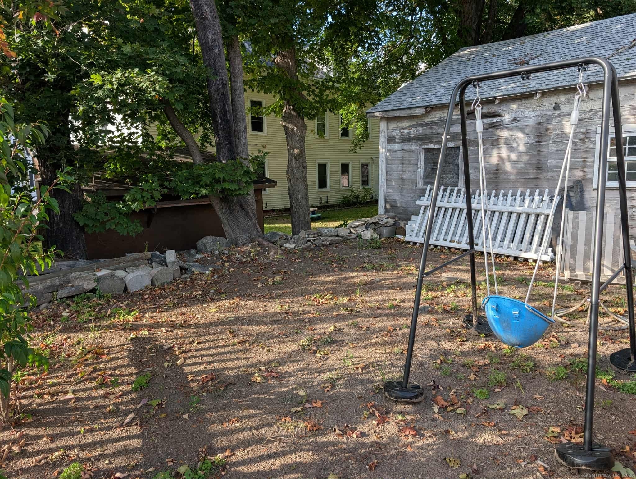 942 Riverside Drive Thompson, CT 06255 - Photo 21 of 21 a view of a house with a backyard