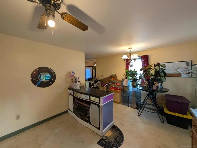 a view of a workspace with furniture