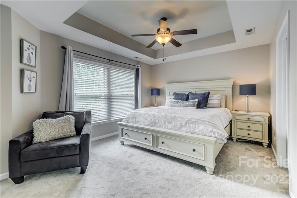 3558 Richard's Crossing Fort Mill, SC 29708 - Photo 18 of 35 a bedroom with a bed couch and window