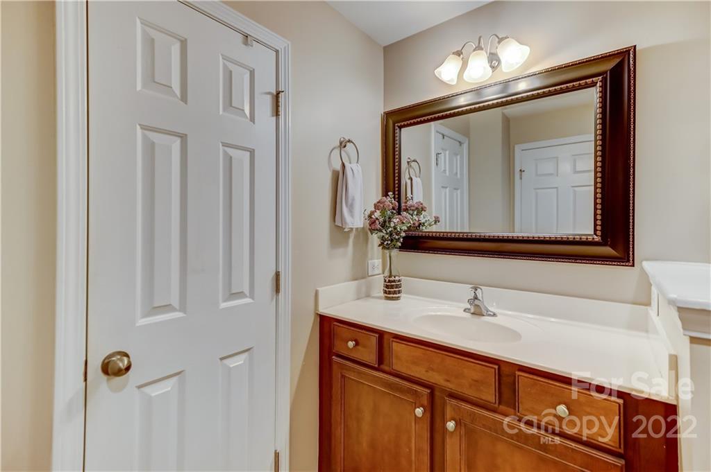3558 Richard's Crossing Fort Mill, SC 29708 - Photo 22 of 35 a bathroom with double vanity and a mirror