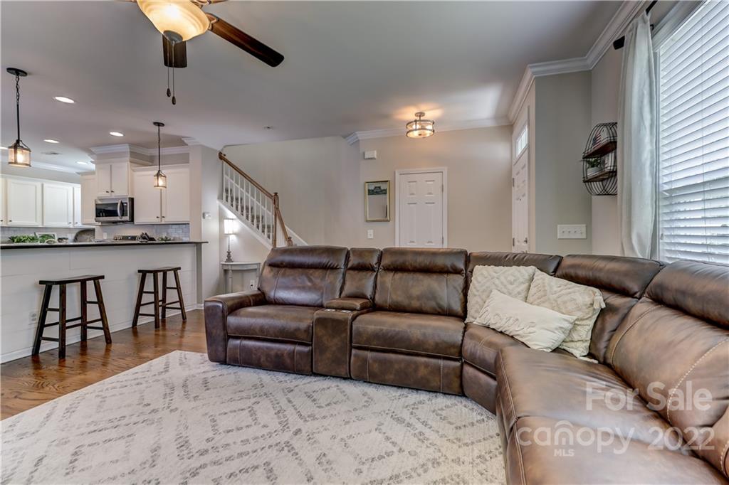 3558 Richard's Crossing Fort Mill, SC 29708 - Photo 8 of 35 a view of a living room kitchen and a wooden floor