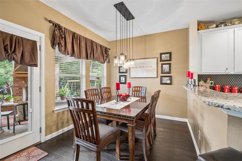 403 Springtree Road Lake Dallas, TX 75065 - Photo 11 of 34 a dining room with furniture and window