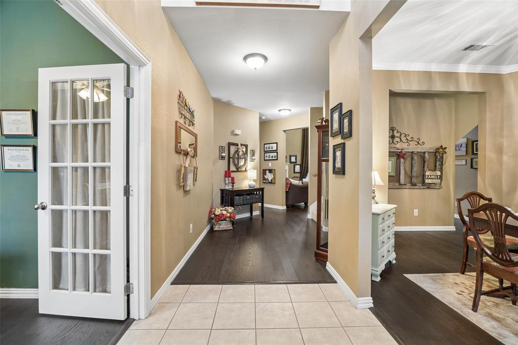 403 Springtree Road Lake Dallas, TX 75065 - Photo 5 of 34 a view of a hallway with living room and dining room