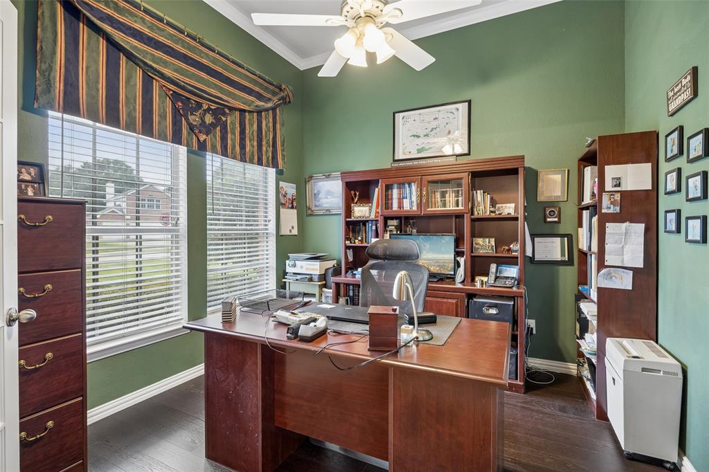 403 Springtree Road Lake Dallas, TX 75065 - Photo 6 of 34 a dining room with furniture and wooden floor