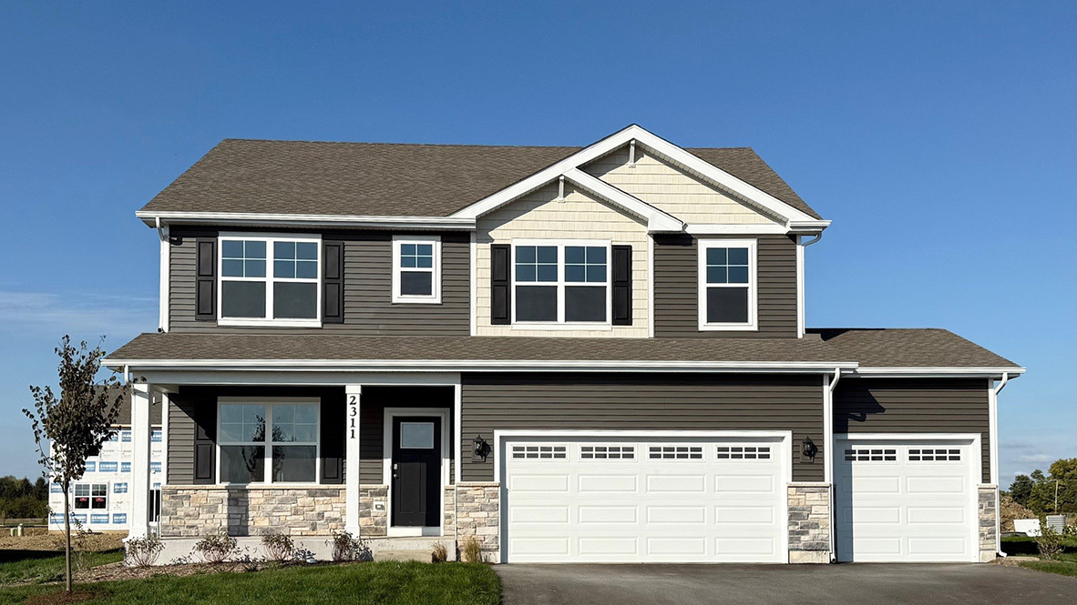 2311 Hirsch Road Oswego, IL 60543 - Photo 1 of 40 a front view of a house with yard
