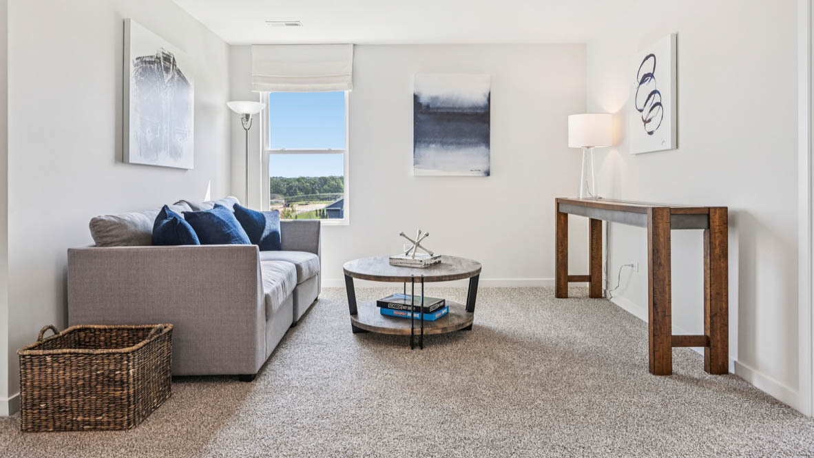 2311 Hirsch Road Oswego, IL 60543 - Photo 21 of 40 a living room with furniture and a window