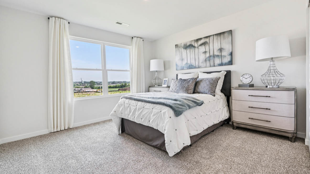 2311 Hirsch Road Oswego, IL 60543 - Photo 35 of 40 a bed room with a bed and a window