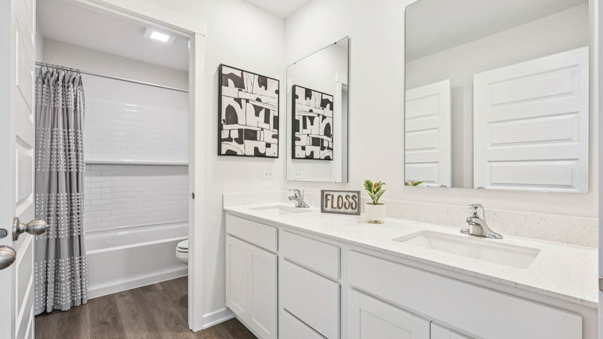 2311 Hirsch Road Oswego, IL 60543 - Photo 37 of 40 a bathroom with a sink and a mirror