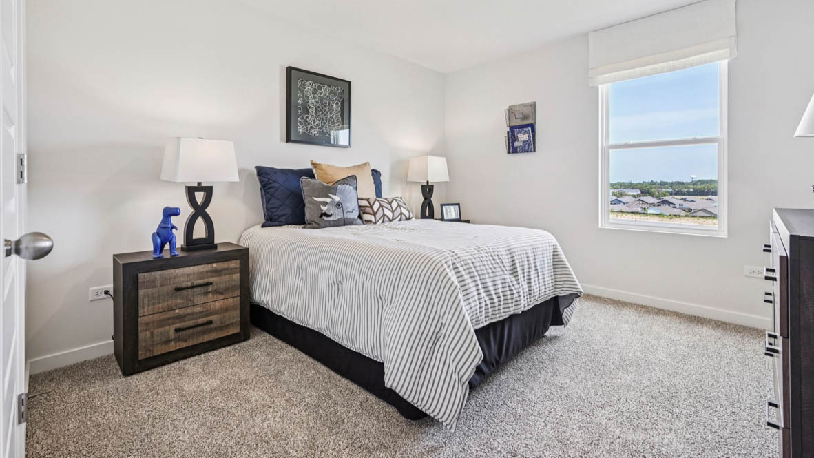 2311 Hirsch Road Oswego, IL 60543 - Photo 39 of 40 a bedroom with a bed and a window