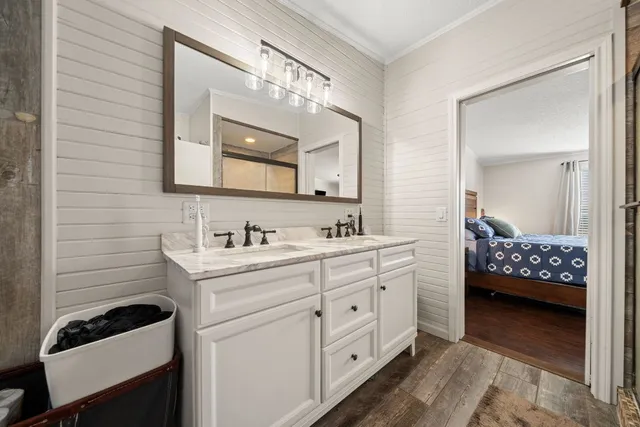 a view of balcony with wooden floor and outdoor seating