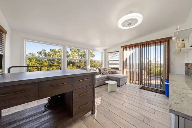 a view of a terrace with seating space