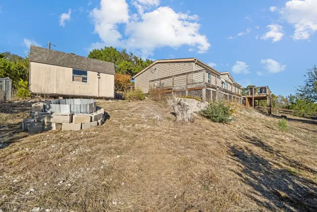a kitchen with stainless steel appliances a refrigerator and cabinets
